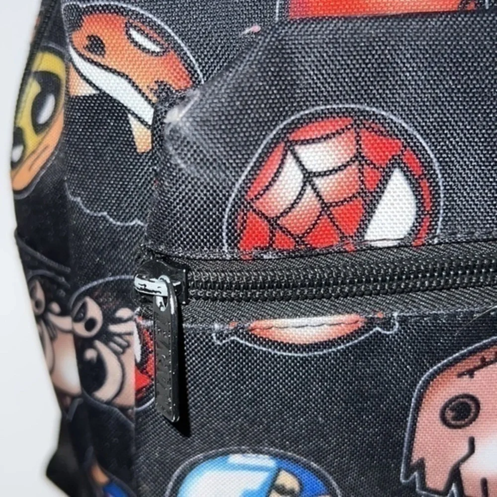 Marvel backpack. Some scuffs throughout but otherwise in good condition.